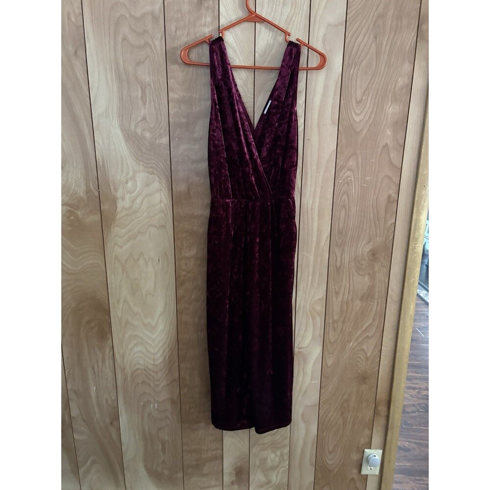 Xhilaration red velvet jumpsuit with a surplice top and‎ a stretchy waist Size S